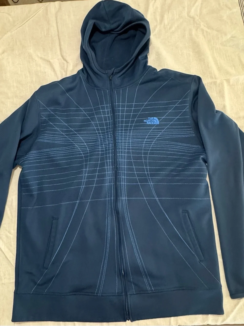 The North Face navy hoodie with light blue dotted pattern